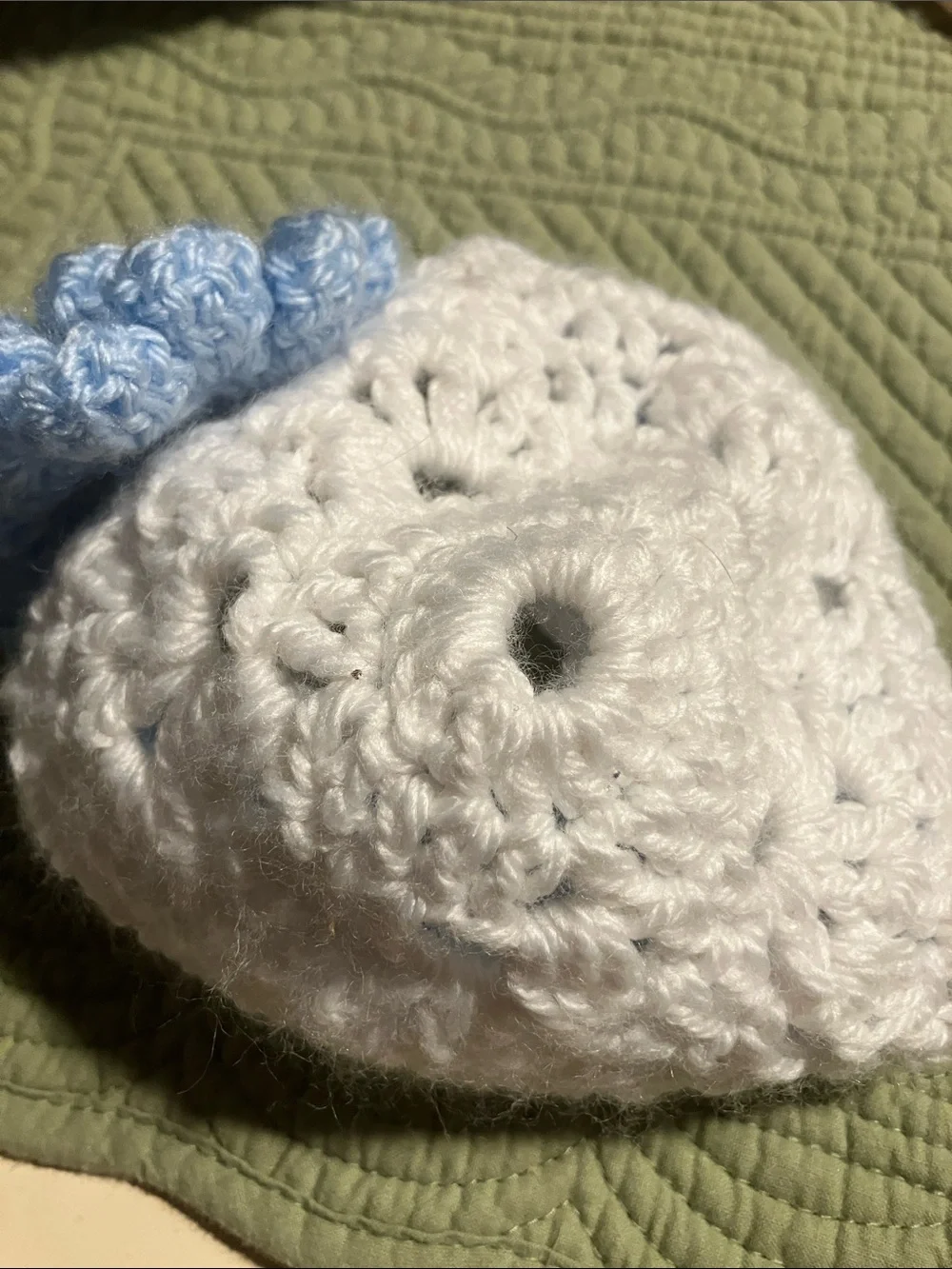 Handmade crocheted hat with flower embellishment 18” circumference